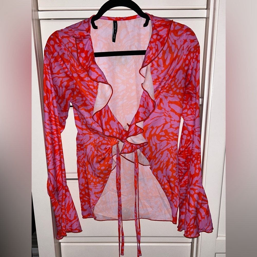 Very cute tie blouse! Worn once!